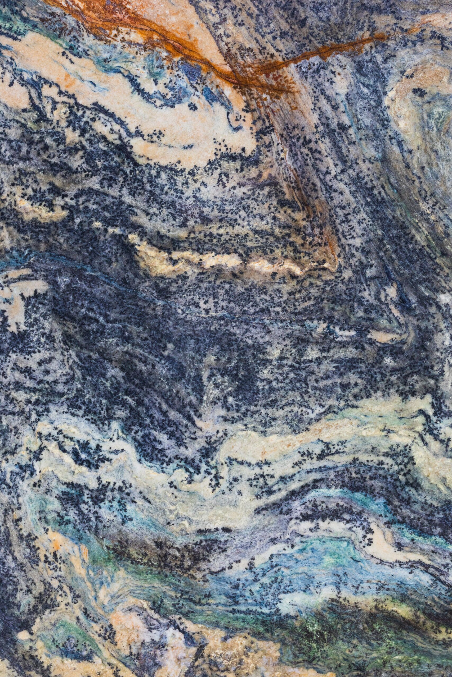 Vibrant abstract pattern of a marble stone texture with blue and orange hues.